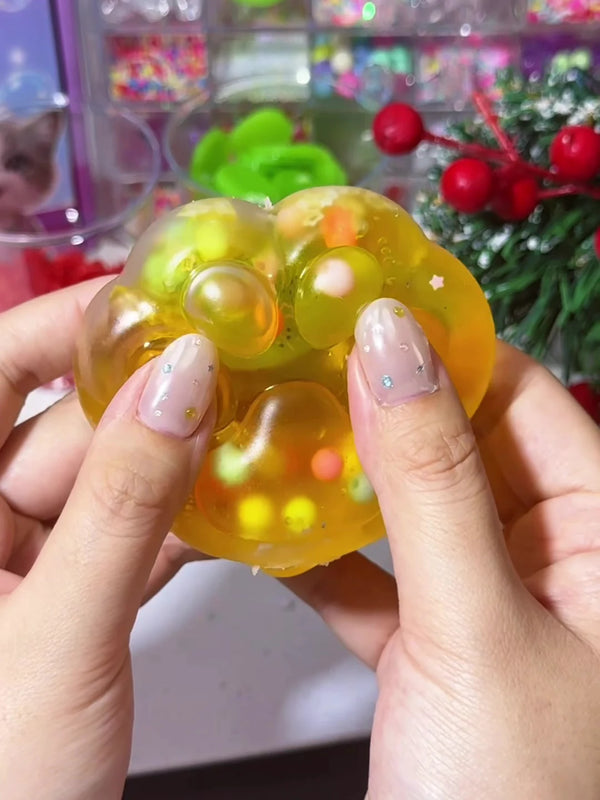 Bolinha amarela com miçangas